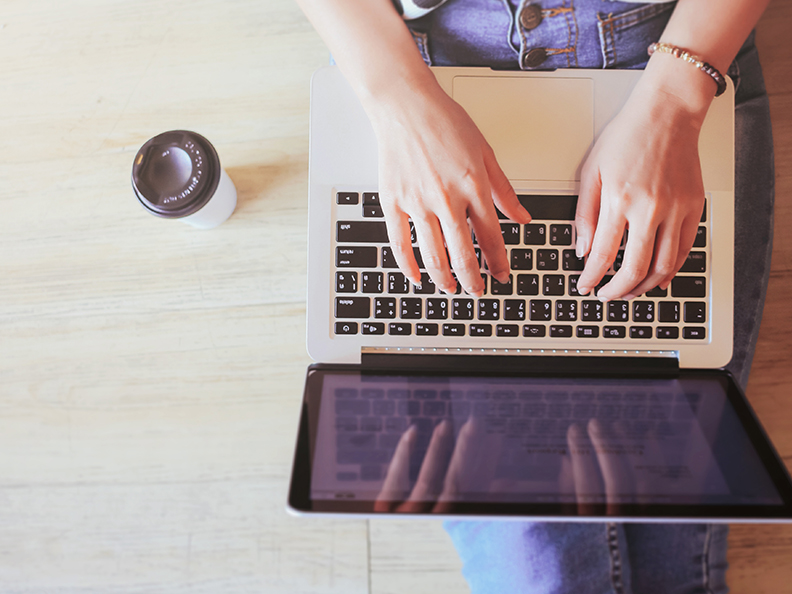 Person typing on laptop